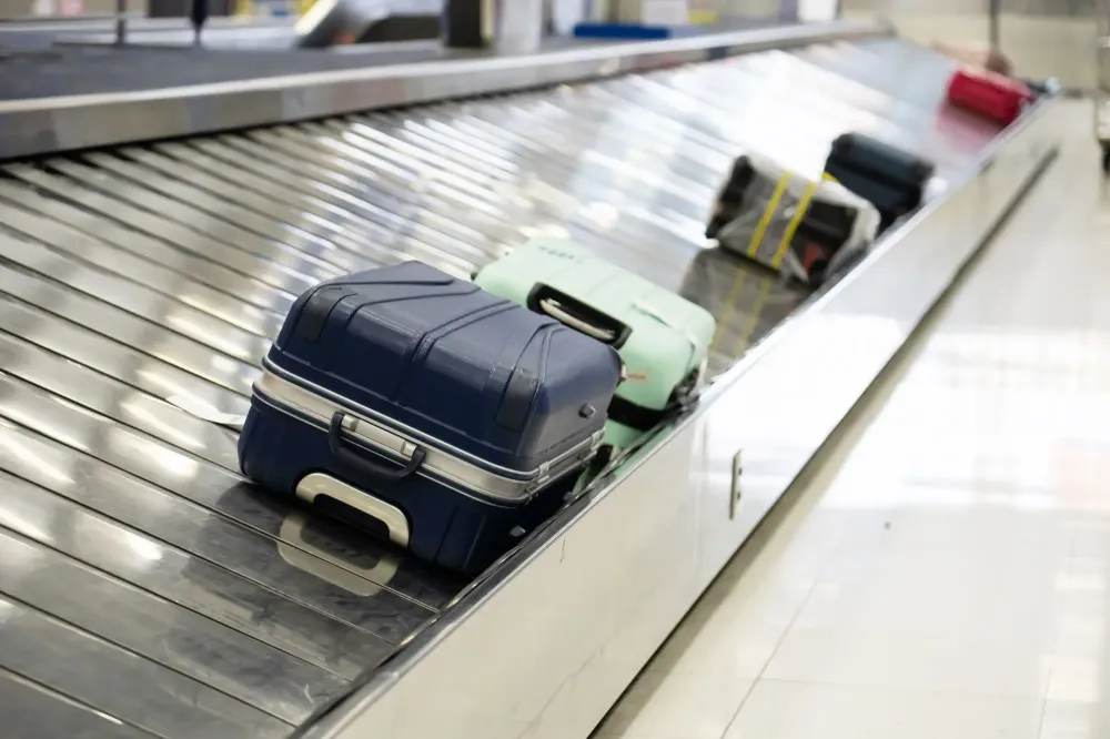 Bags on a baggage carousel in an airport